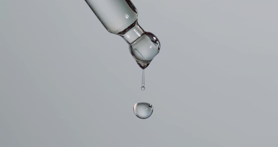 Liquid drips from the vial