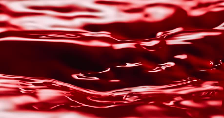 Red paint with ripples and waves on the surface