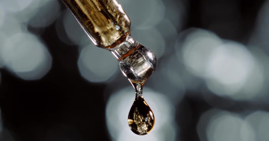 Close up of oil dropper