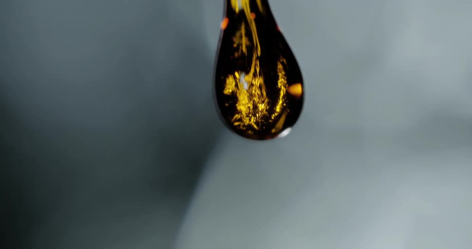 Close up of oil droplet falling