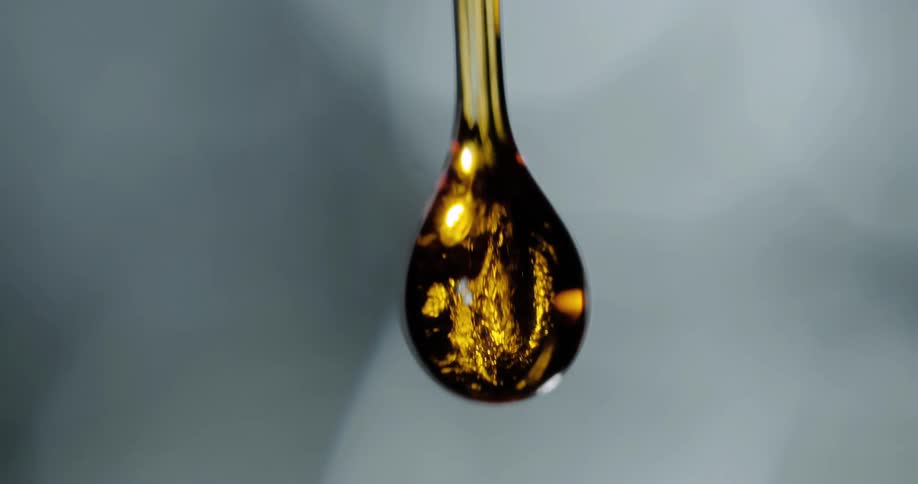 Close up of oil droplet falling