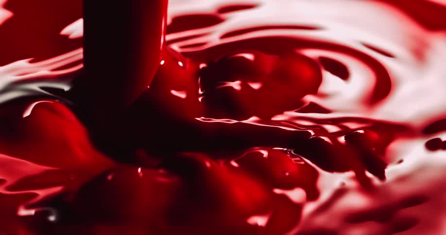 The red liquid is pouring