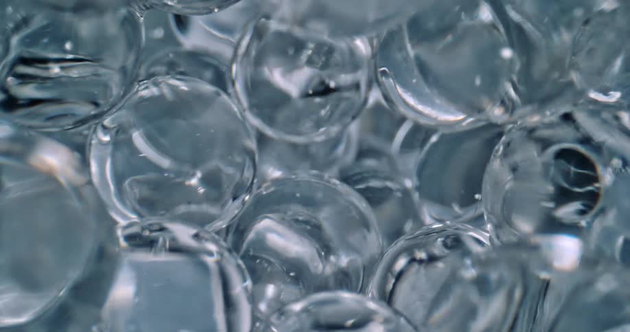 A bunch of liquid orbs dropped on top of one another