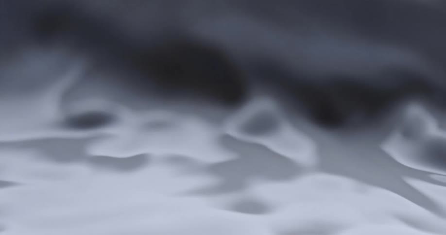 Light shines on pouring white liquid as it ripples and moves