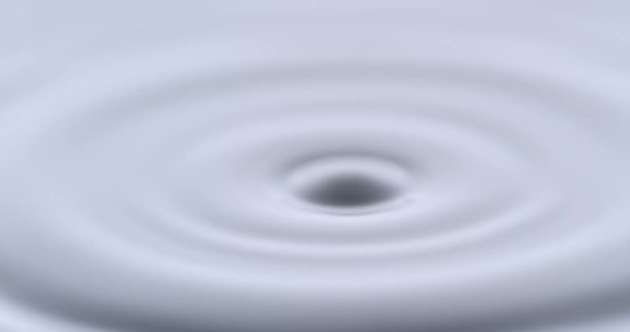 Droplet falls into white paint liquid
