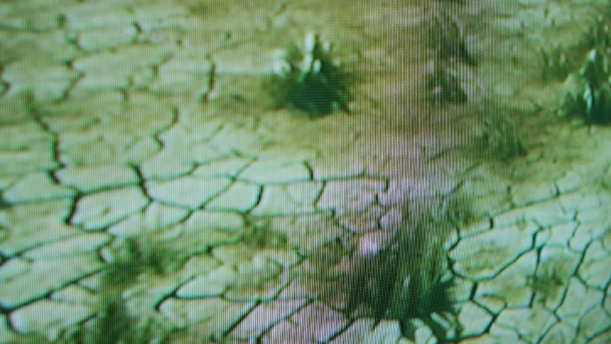 Close up of television screen showing drought field