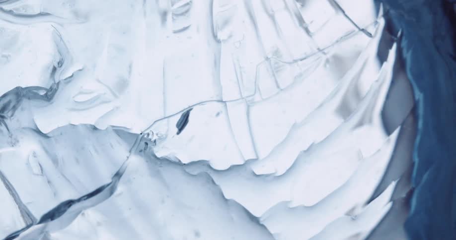 Close up of ice cube breaking up