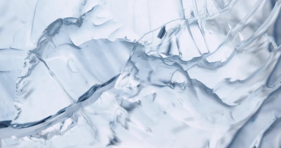 A close up of textured ice breaking apart