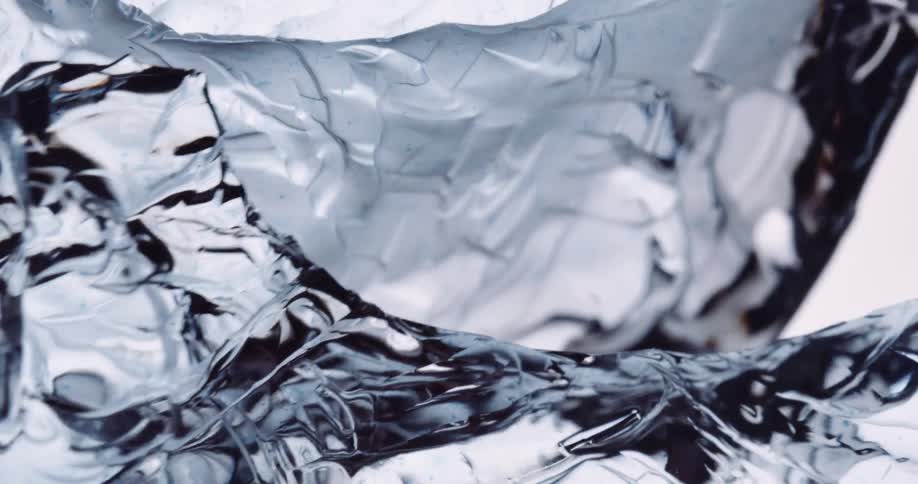 A close up of a piece of ice breaking apart and separating