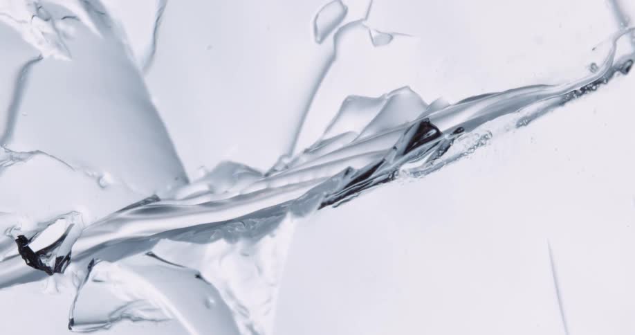 Water flows through a crack in plaster