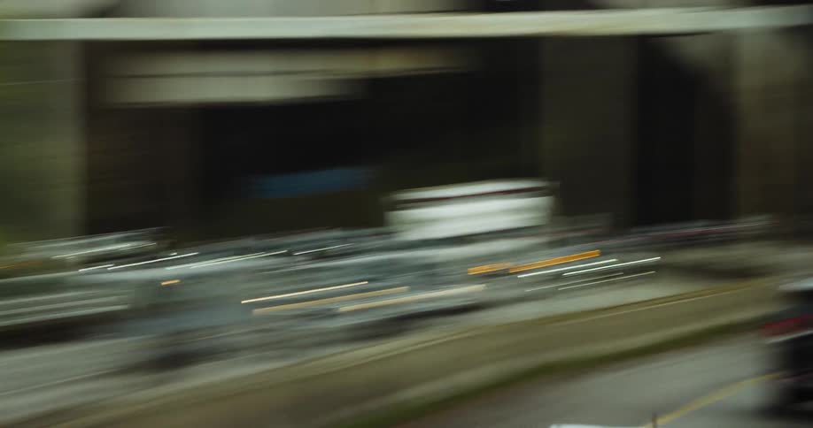 Chaotic view hyper lapse following traffic on a busy interstate during the afternoon on a foggy day