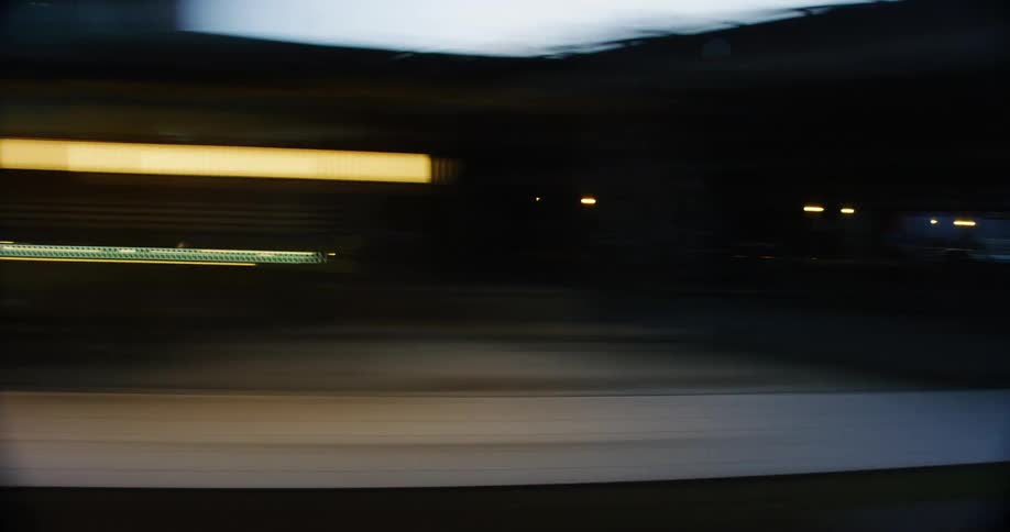 A time lapse of a side view crossing a city