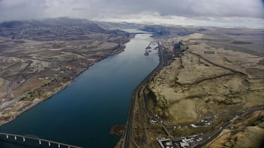 Aerial view of a landscape and river is displayed
