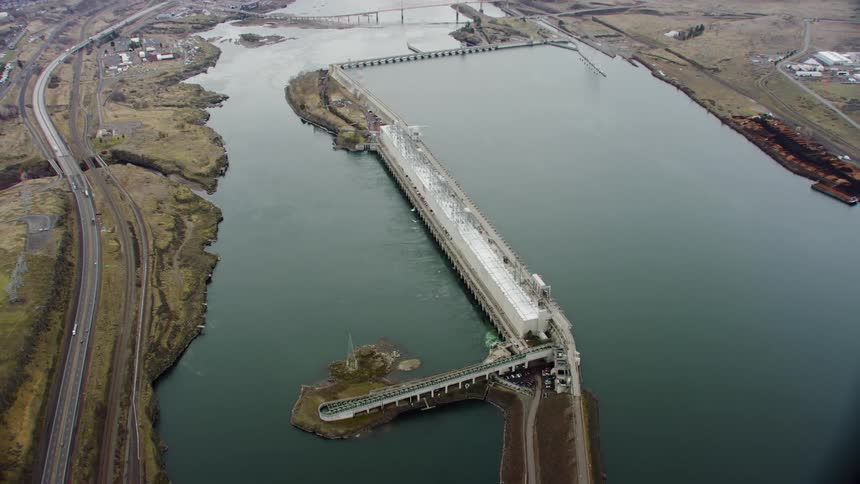 A highway runs along a bridge and pier through a river