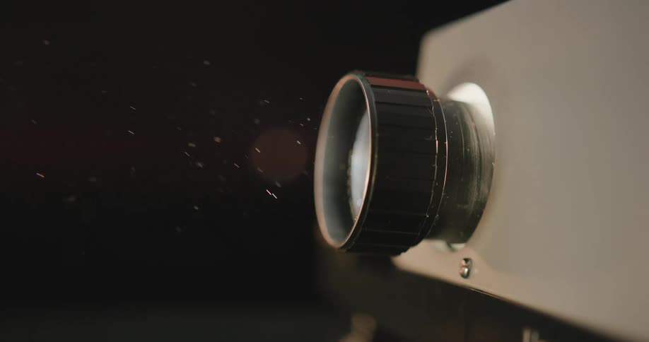 Close up view of a projector in a dark room