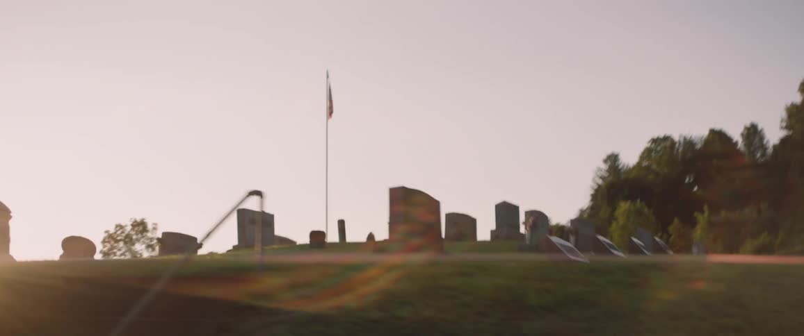 Tombstones and grave sites in cemetery