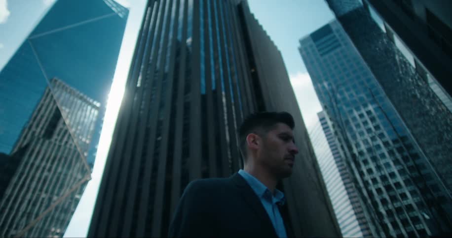 A man walks by the towers