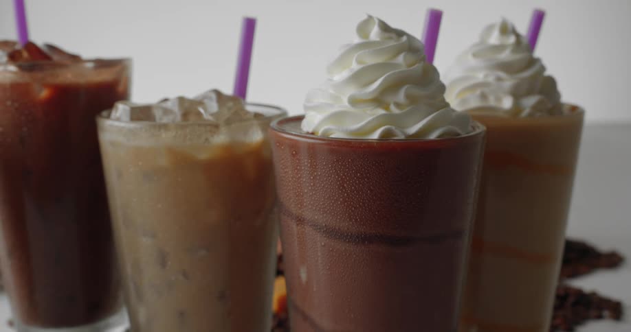 Smoothies and iced coffees on display in a studio