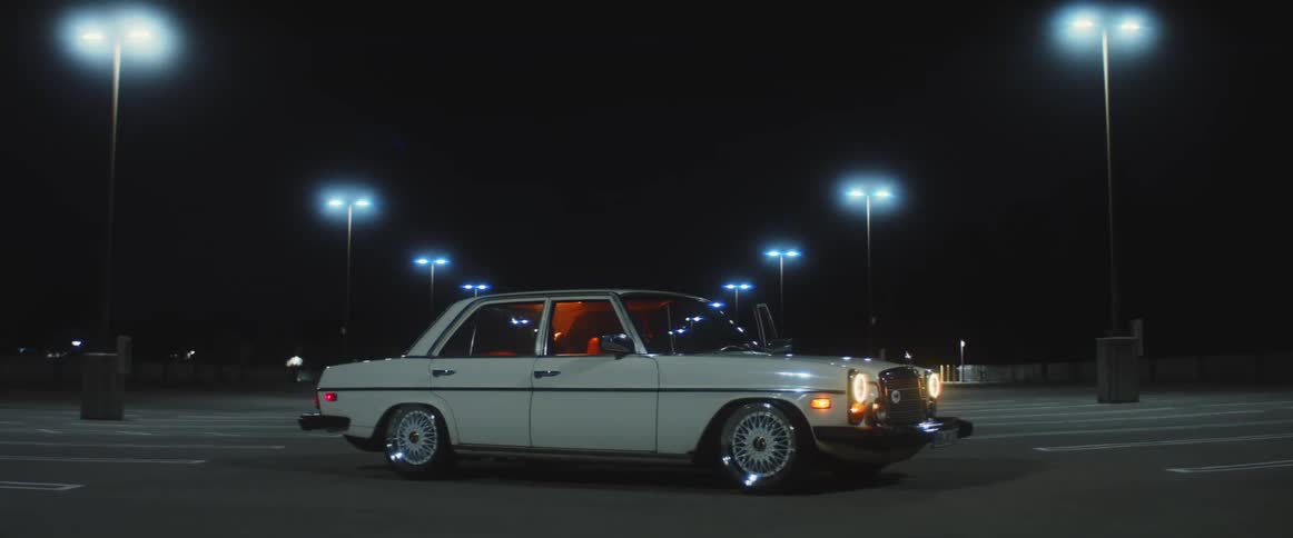 A view of a car in a parking lot