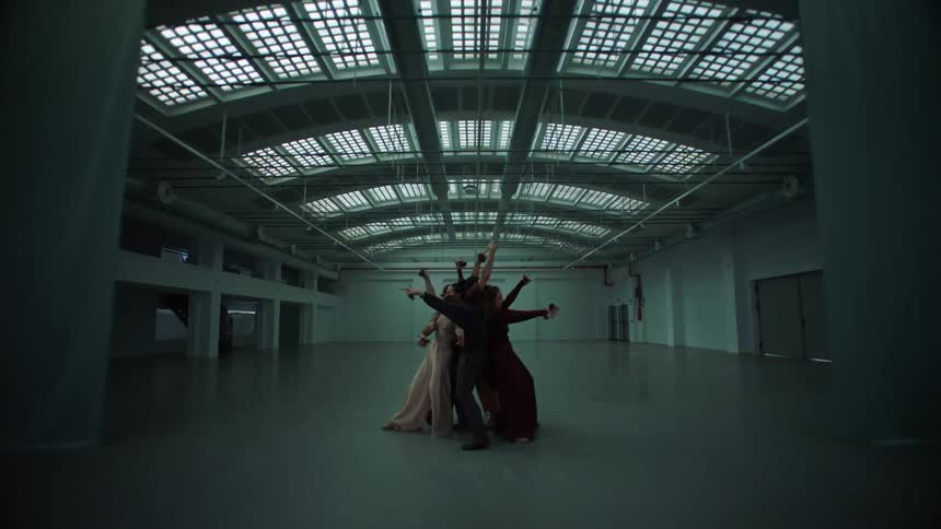 A view of people standing in a room