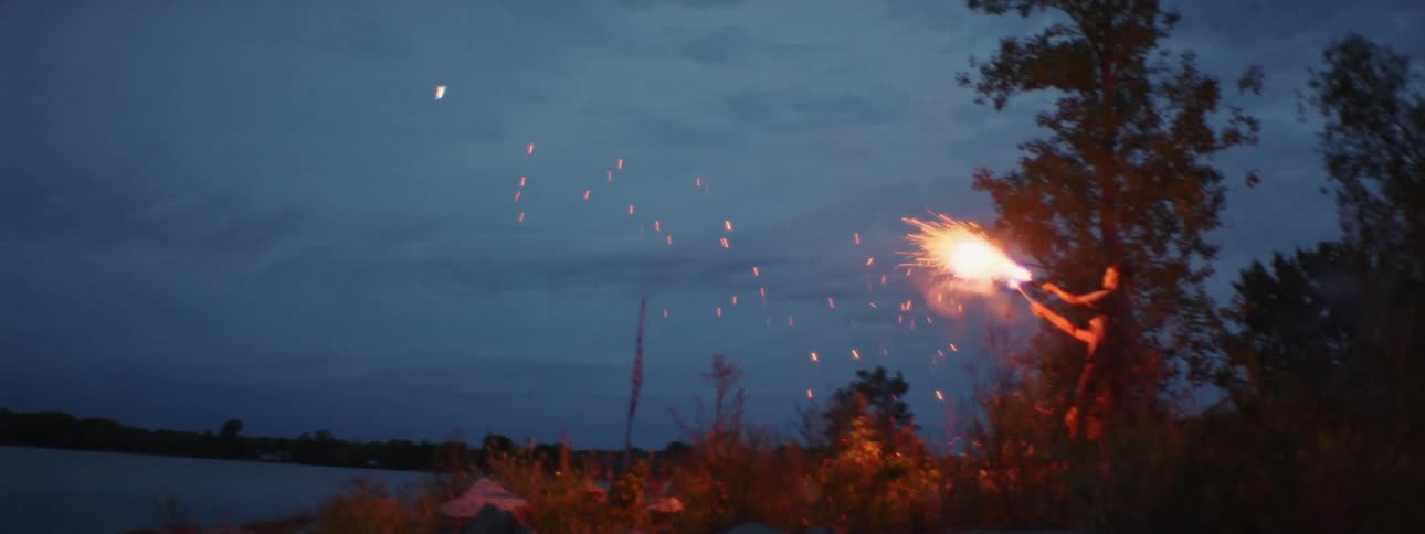 Friends run from rv to shore where they shoot fireworks