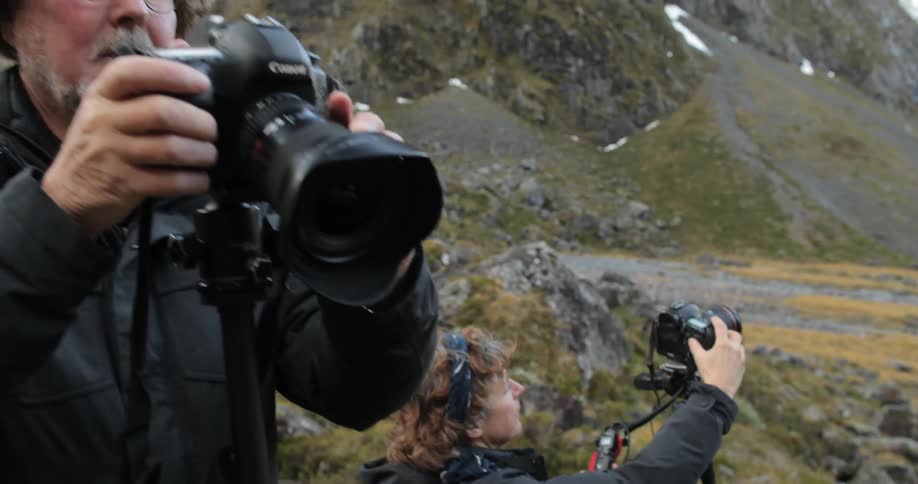 Two photographers take photos in the wilderness
