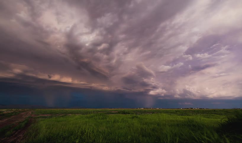 Time lapse of a storm in the distance with lightning flashing all over