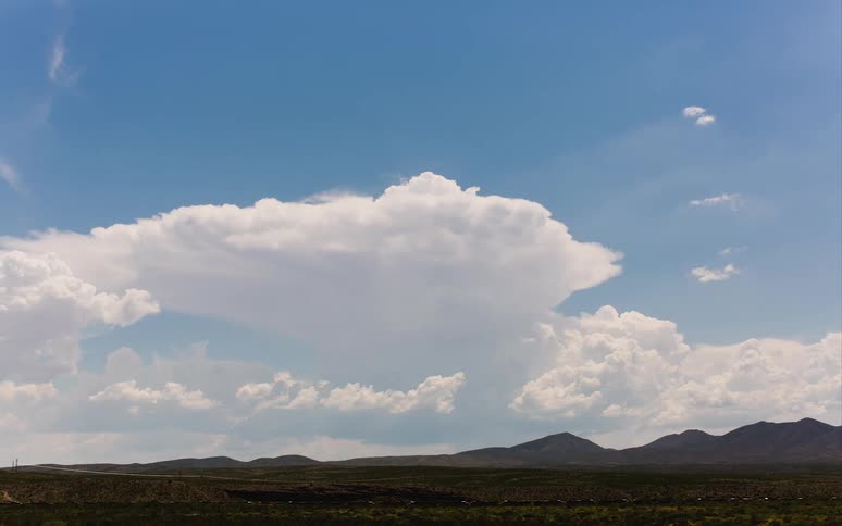 Time lapse of clouds moving and forming in a skyline
