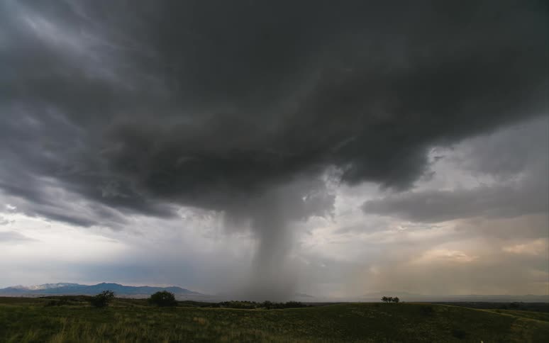 Time-lapse of storm clouds turning into a tornado