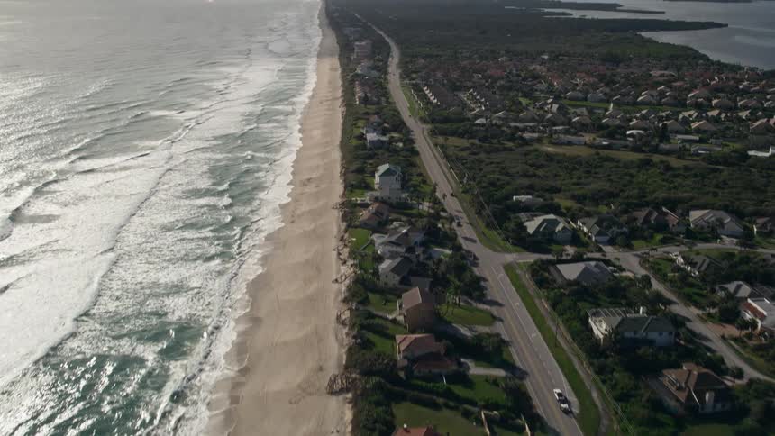 An aerial flyover of the residential beachfront neighborhoods in Melbourne Beach Florida