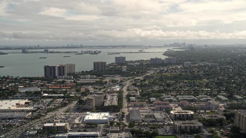 Aerial view of Miami Shores Floridas coastal community featuring apartments and homes along the shoreline