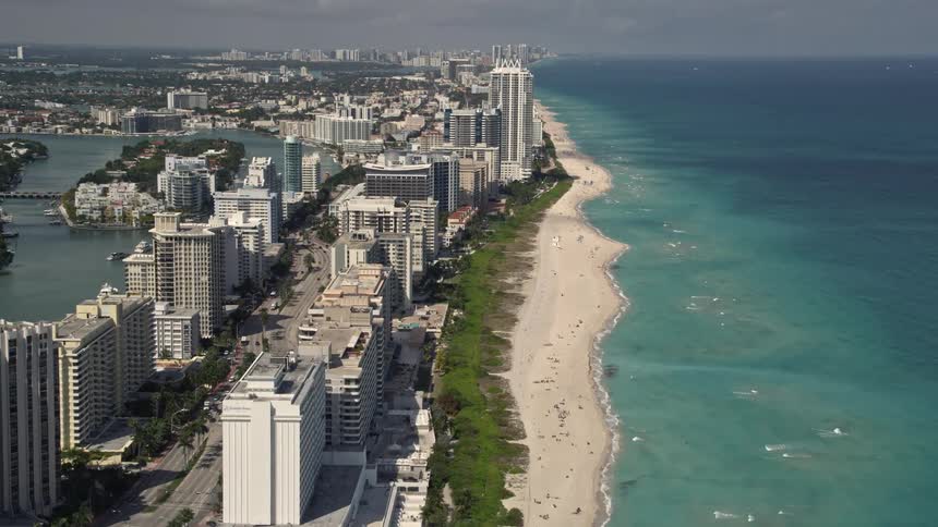 A breathtaking aerial view of beachfront condominiums with ocean views in Miami Beach Florida