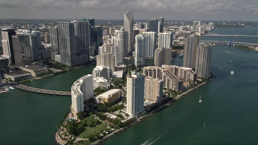 An aerial view of the stunning waterfront hotels and towering skyscrapers on Brickell Key in Miami Florida showcasing the citys beautiful coastline and metropolis