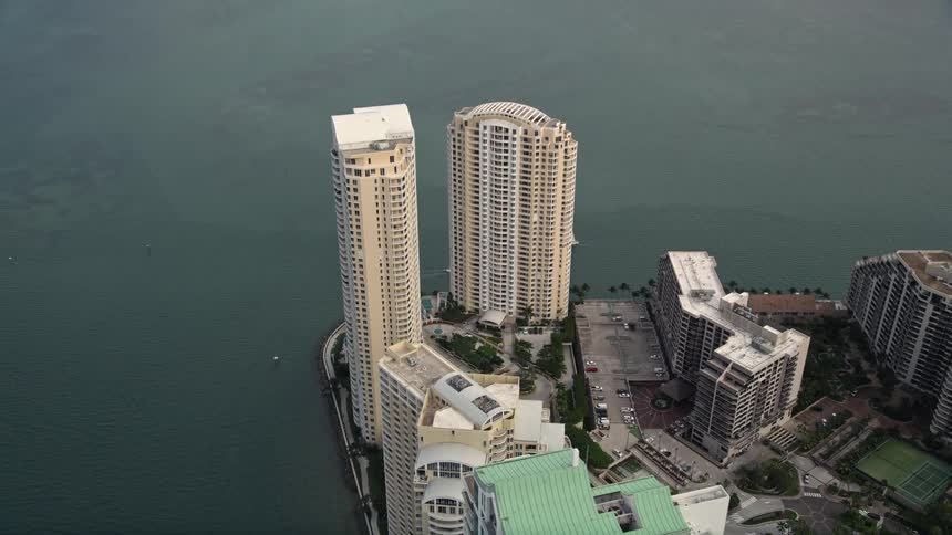 Aerial view of Brickell Key in Downtown Miami Florida showcasing high-rise buildings on the waterfront
