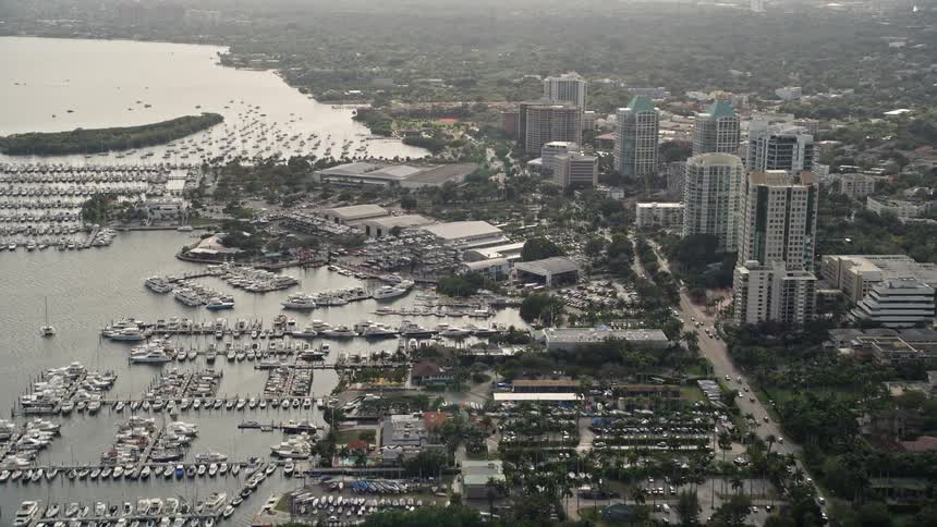 Approaching Dinner Key Marina in Coconut Grove Florida showcasing the marina and surrounding coastline