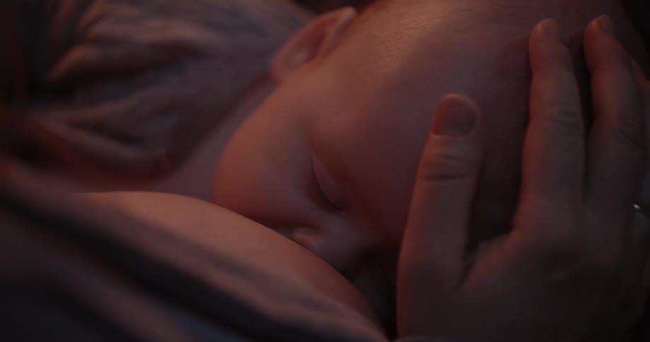 A mother holding her baby