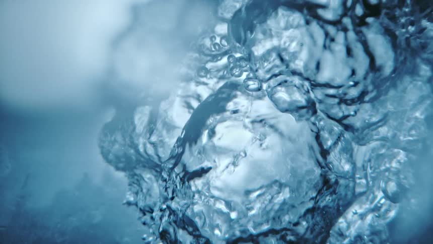 Close up view of water being poured is displayed