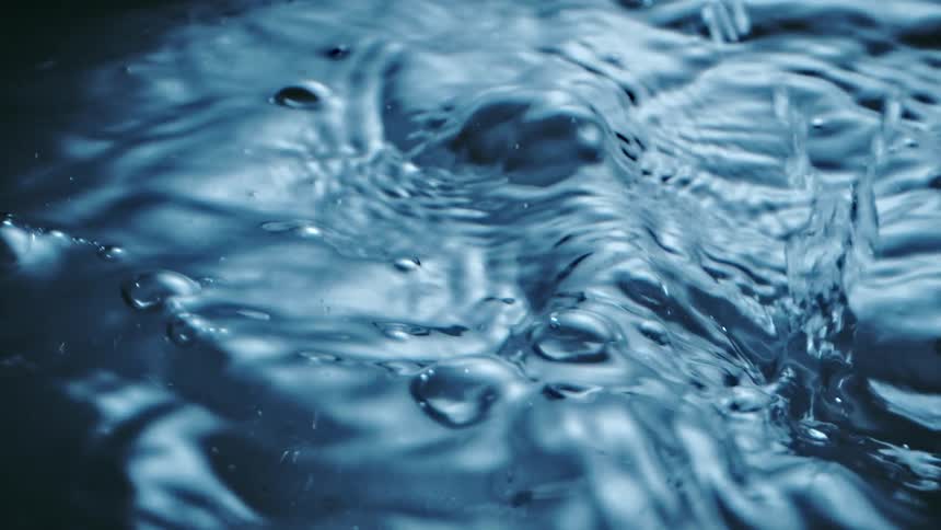 A shot of water being poured into something