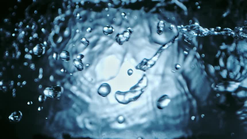 Close up view of water droplets is displayed