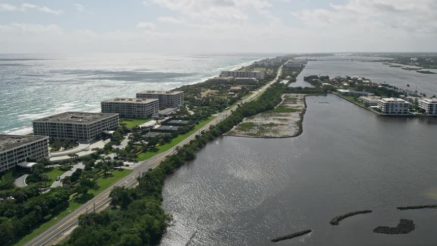Aerial footage of office buildings along the oceanfront on Lakeside Road in Palm Beach Florida