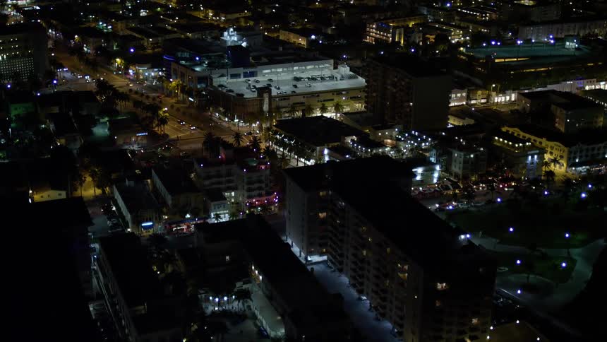 Aerial view of South Beachs bustling nightlife scene with cafes and shops dotting the intersection below