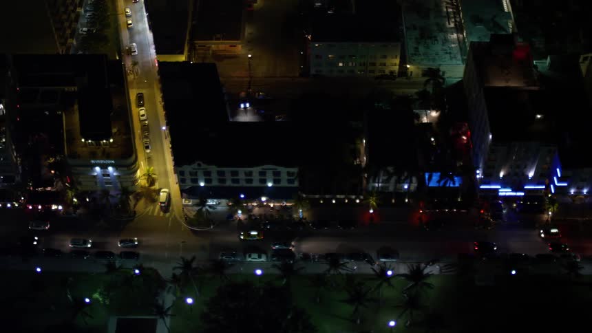 A stunning aerial view of the Ocean Drive hotels at night in South Beach Florida