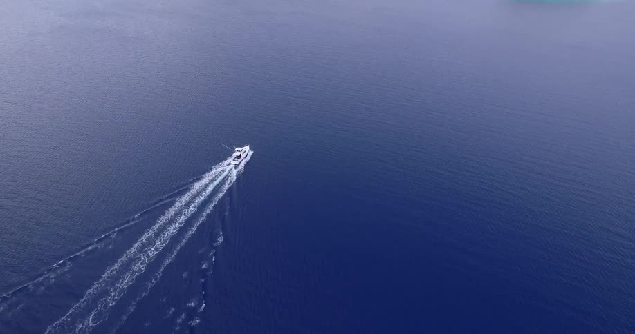 A boat traveling down a large body of water