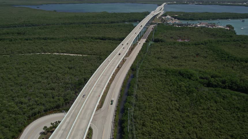 Aerial view of Overseas Highway showcasing the Anchorage Resort and Yacht Club and Gilberts Resort in Key Largo Florida
