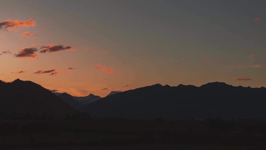 Time lapse of a beautiful sunset over a mountain range