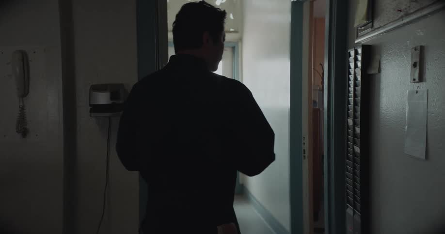 A man punching in or out of work