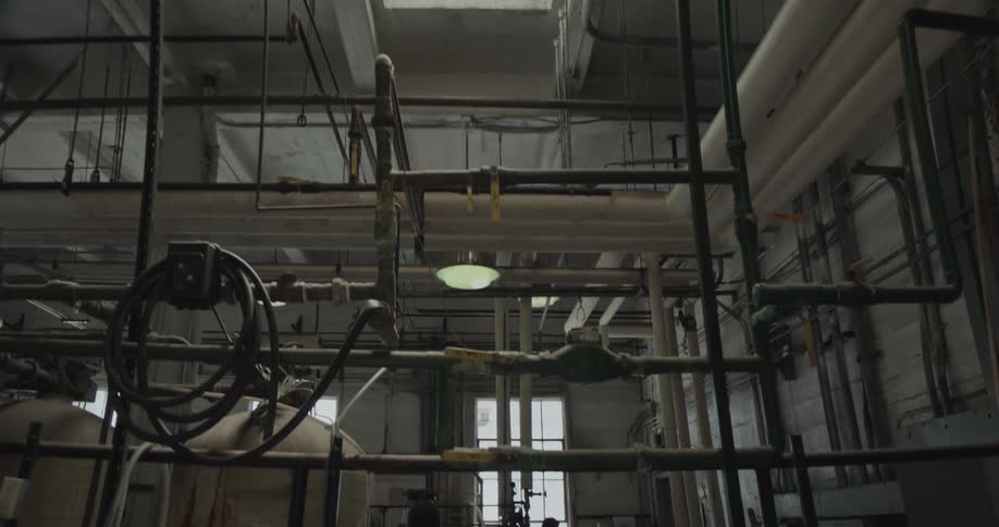 A worker walks through the factory