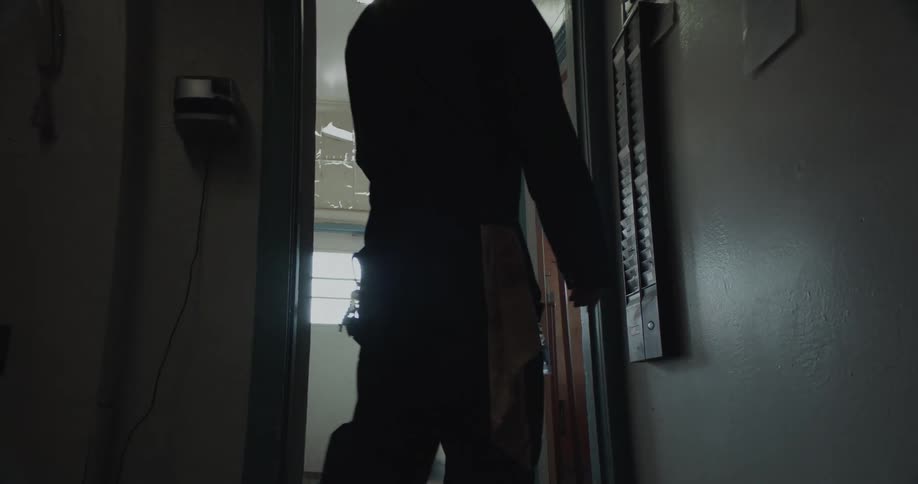 A man walks out the door