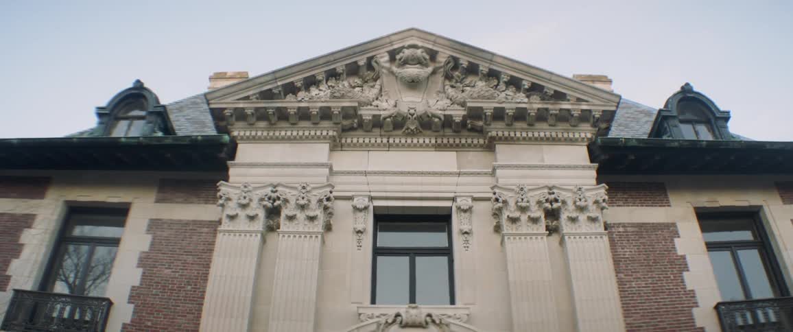 A building faced with carved columns and figures