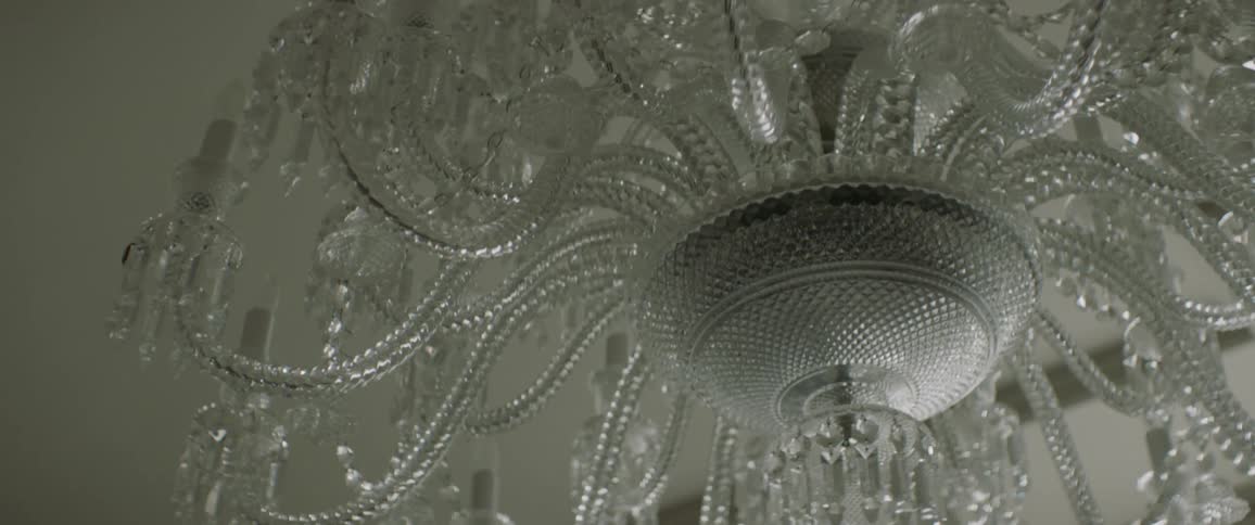 A large crystal chandelier hanging from the ceiling